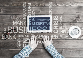 Close view of woman in checked shirt at her workplace