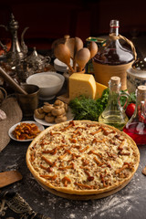 Mushroom pizza with marinated champignons and honey agarics.