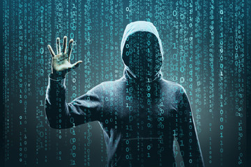 Anonymous computer hacker over abstract digital background. Obscured dark face in mask and hood....