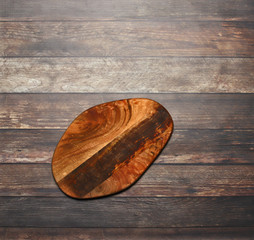 Wooden texture with curvy wodden board flat lay