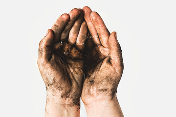 Hands of a child with dirty water. Epidemic, viruses, bacteria in water, diseases of dirty hands....