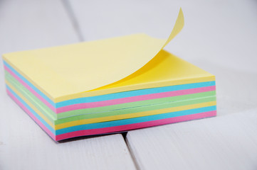 Packing stickers lies on white boards. blurred background