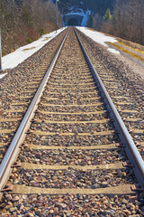 Fototapeta premium Deserted Railroad in full day with tunnel in the background