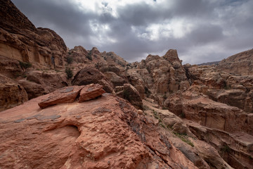 Fototapeta na wymiar Stony red landscape of Petra in Jordan
