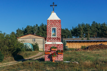 Small roaside Roman Catholic shrine in Kashubia region of Poland - obrazy, fototapety, plakaty