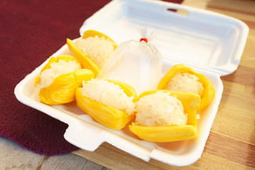 Sticky rice with mango and coconut cream in foam box,Thailand dessert street food.