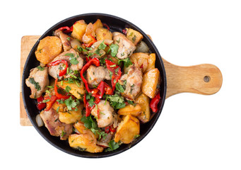 Roast pork fillets with potatoes and paprika.