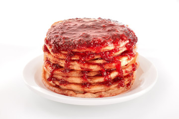 Classic american pancakes with raspberries jam