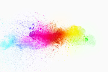 Colorful powder explosion on white background. Pastel color dust particle splashing.
