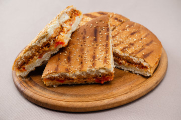sandwich on wooden board