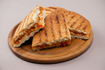 sandwich on wooden board