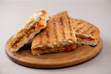 sandwich on wooden board