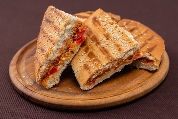 sandwich on wooden board