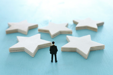 Obraz premium concept image of setting a five star goal. increase rating or ranking, evaluation and classification idea