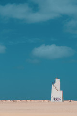 small towaer on the beach