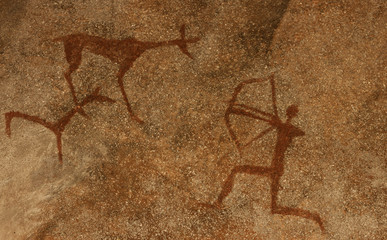 Image of ancient hunting on the cave wall. history of antiquities. archaeology.