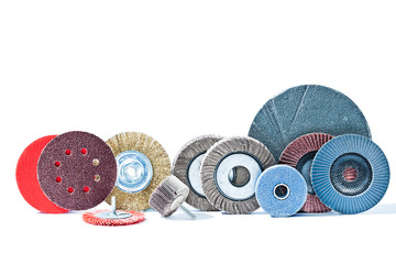 big set of rotary abrasive wheels construction tools isolated on white