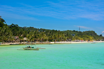 Fototapeta na wymiar Boat in the sea. Bay of Boracay island, Philippines