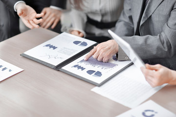 close up.the business team checks the marketing schedule