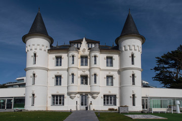 Fototapeta na wymiar White castle of gothic style built in 1868 in Pornichet