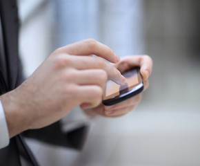 businessman hand use phone ,Close up of a man using mobile smar