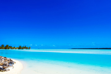 View of the sandy beach, Aitutaki island, Cook Islands, South Pacific. Copy space for text.   ..
