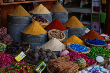 Fototapeta premium Selection of colourful herbs, spices, soaps and other craft products being sold in the souks of the Medina of Marrakesh (Marrakesh, Morocco, Africa)