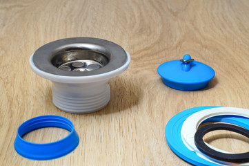 Concept of plumbing works top view on wooden background.