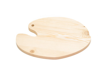 pine cutting board made as result of milling cutting on a white background