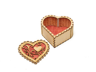 wooden box in the form of a heart on white background