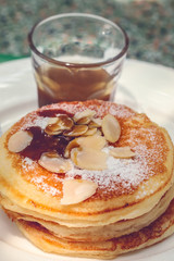 pancakes with salted caramel topping and walnuts