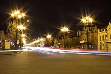 Fototapeta na wymiar Night traffic. Light paths on the highway from cars.