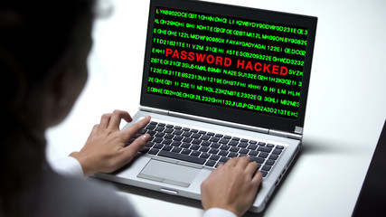 Password hacked on laptop computer, woman working office, cybercrime protection