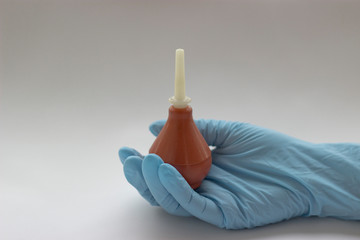 Medical enema in hand