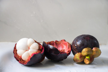 Fresh ripe mangosteen isolated on white background with clipping path.