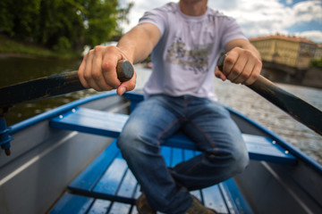 Obraz premium Man on a rowing boat background