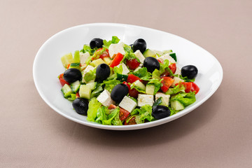 salad in a white plate