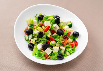 salad in a white plate