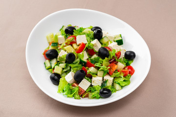 salad in a white plate