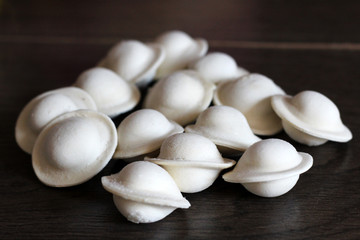 Dumplings on a wooden Board