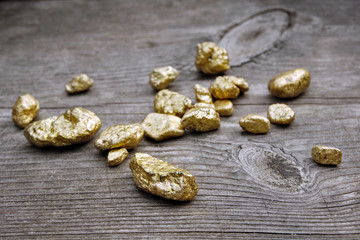 Pure gold ore on old wood