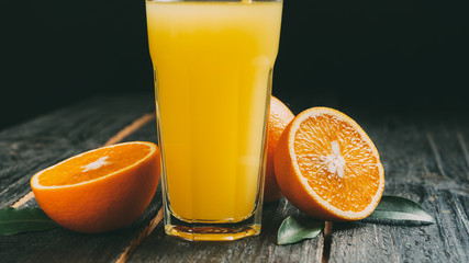 Fresh Orange juice on wooden background