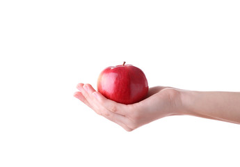 Female hand holding red apple isolated on white background