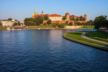 Fototapeta na wymiar Wawel Castle at Vistula River in Krakow