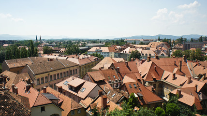 Fototapeta na wymiar Aerial photo, Scenic view of the roofs of old town, sunny day, Ljubljana, Slovenia