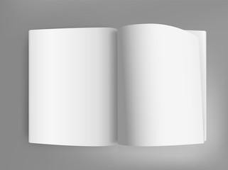 White open book on grey table
