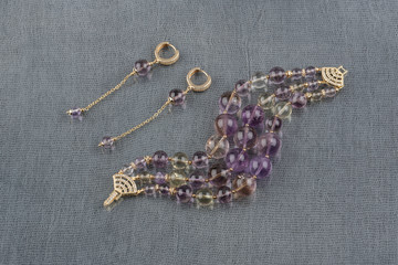 Earrings and a bracelet suit from multi-colored amethyst
