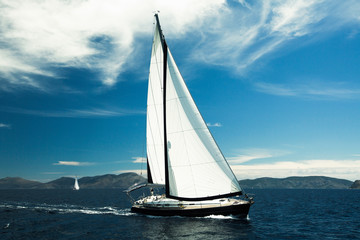 Fototapeta premium Sailing yacht boat in the Sea. Luxury Yachts for vacation.