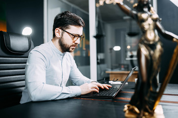 Scales of justice in jurisprudence. The concept of a male judge, the prosecutor. The work of a...