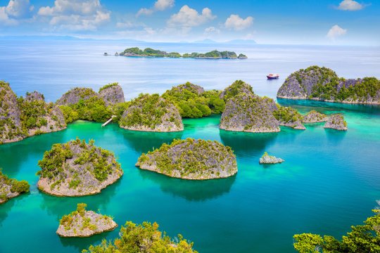 Picturesque tropical lagoon of  islands with reef coastline  and turquoise water